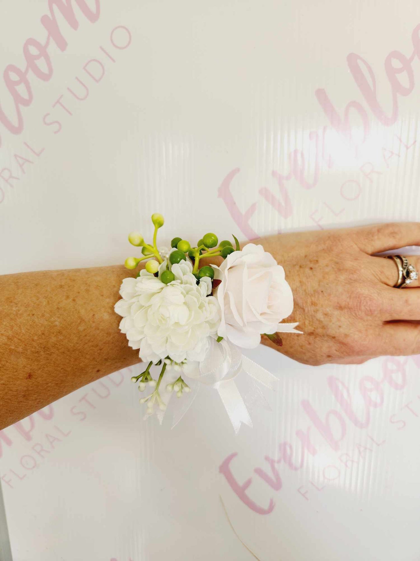 Beautiful wrist corsages and buttonholes for school balls, weddings and events. Located near Bayfair, we are your local Mount Maunganui and Papamoa florist. Same day flower delivery to Papamoa Mount Maunganui and Tauranga from our florist to you. Everbloom floral studio is your local friendly florist